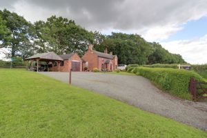 Front/Side Elevation & Garden- click for photo gallery